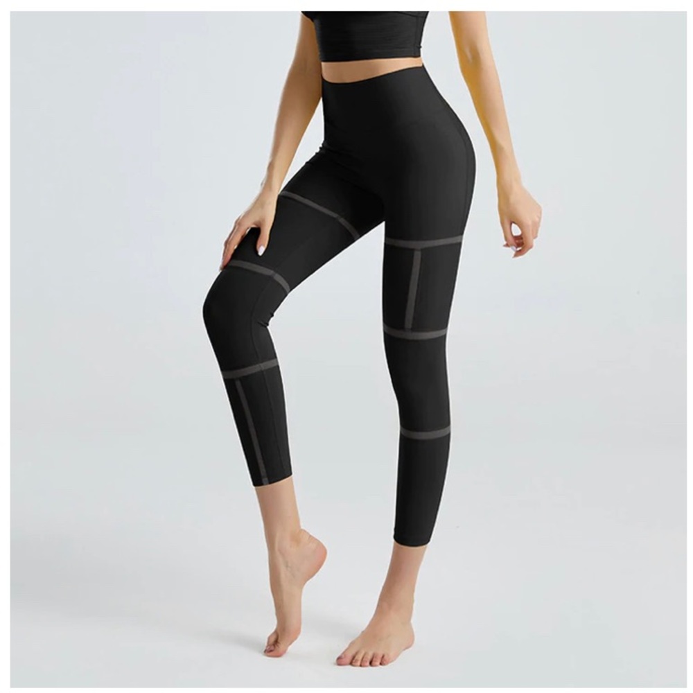 Brand new black leggings with striped mesh